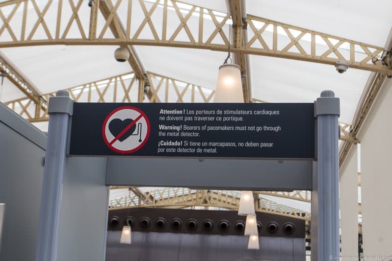 traveling with a pacemaker security screening warning sign