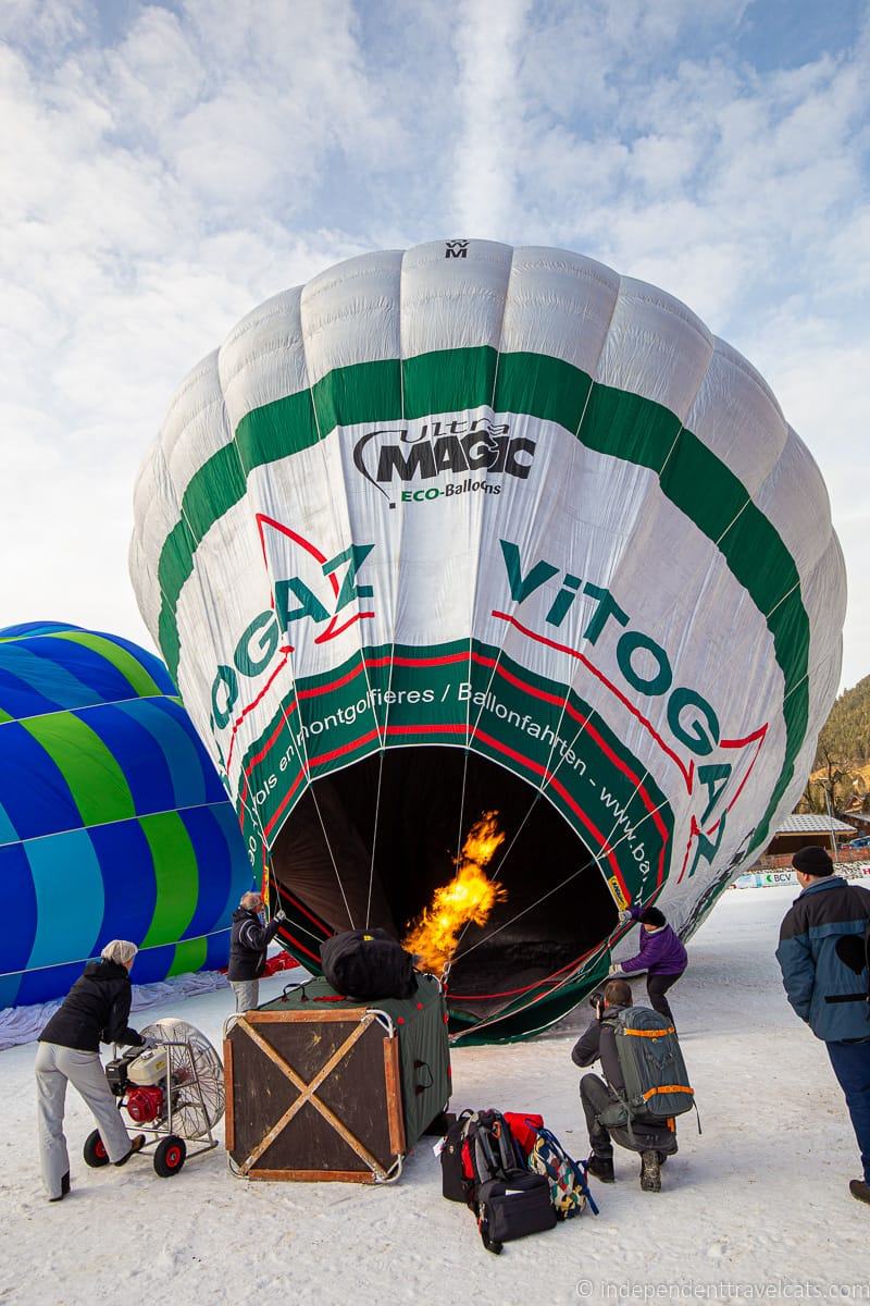hot air balloon inflating Château-d'Oex International Hot Air Balloon Festival in Switzerland Festival International de Ballons